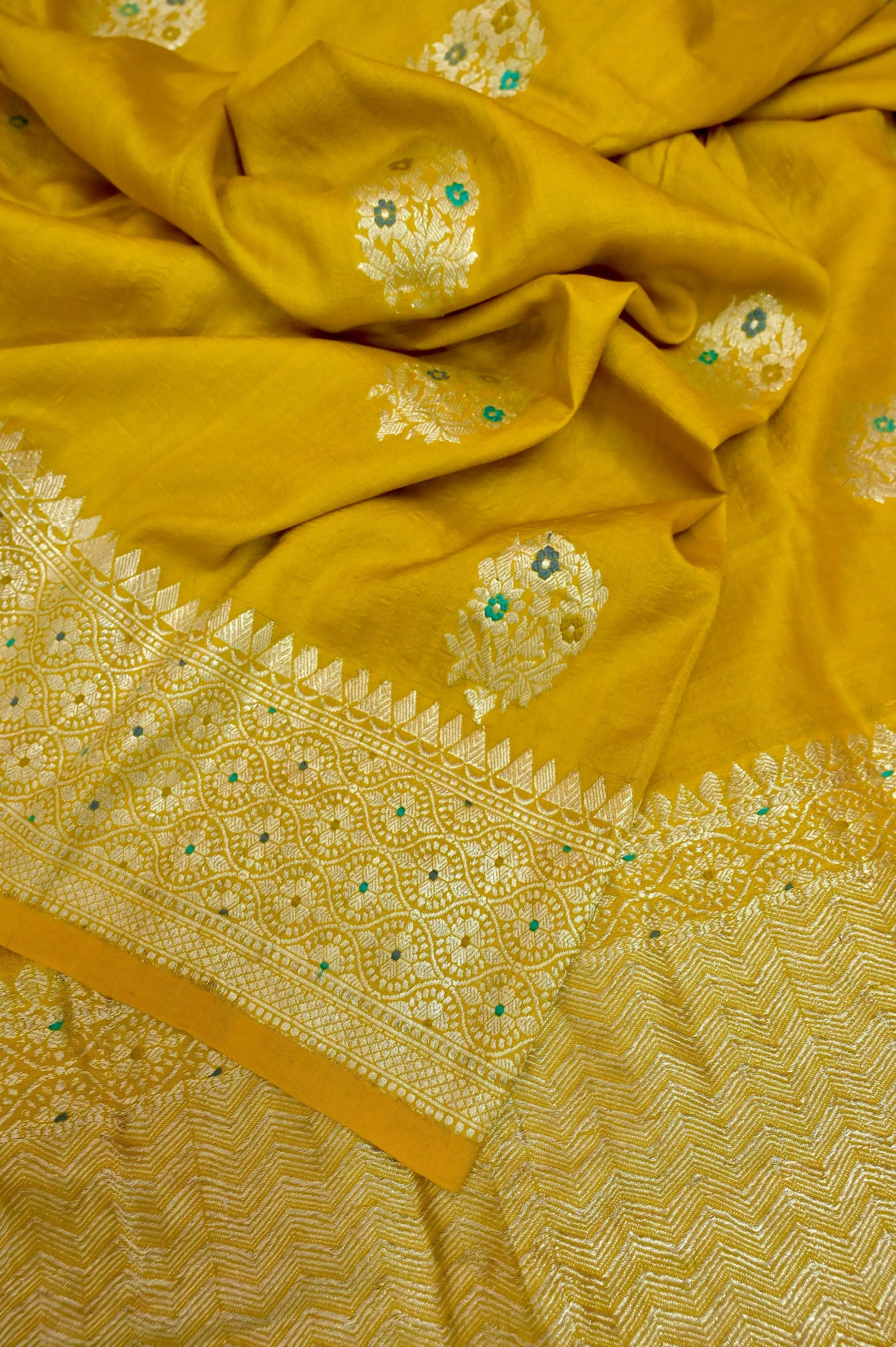 Amber Yellow Color Tussar Georgette Banarasi Saree with Meenakari Buta Work