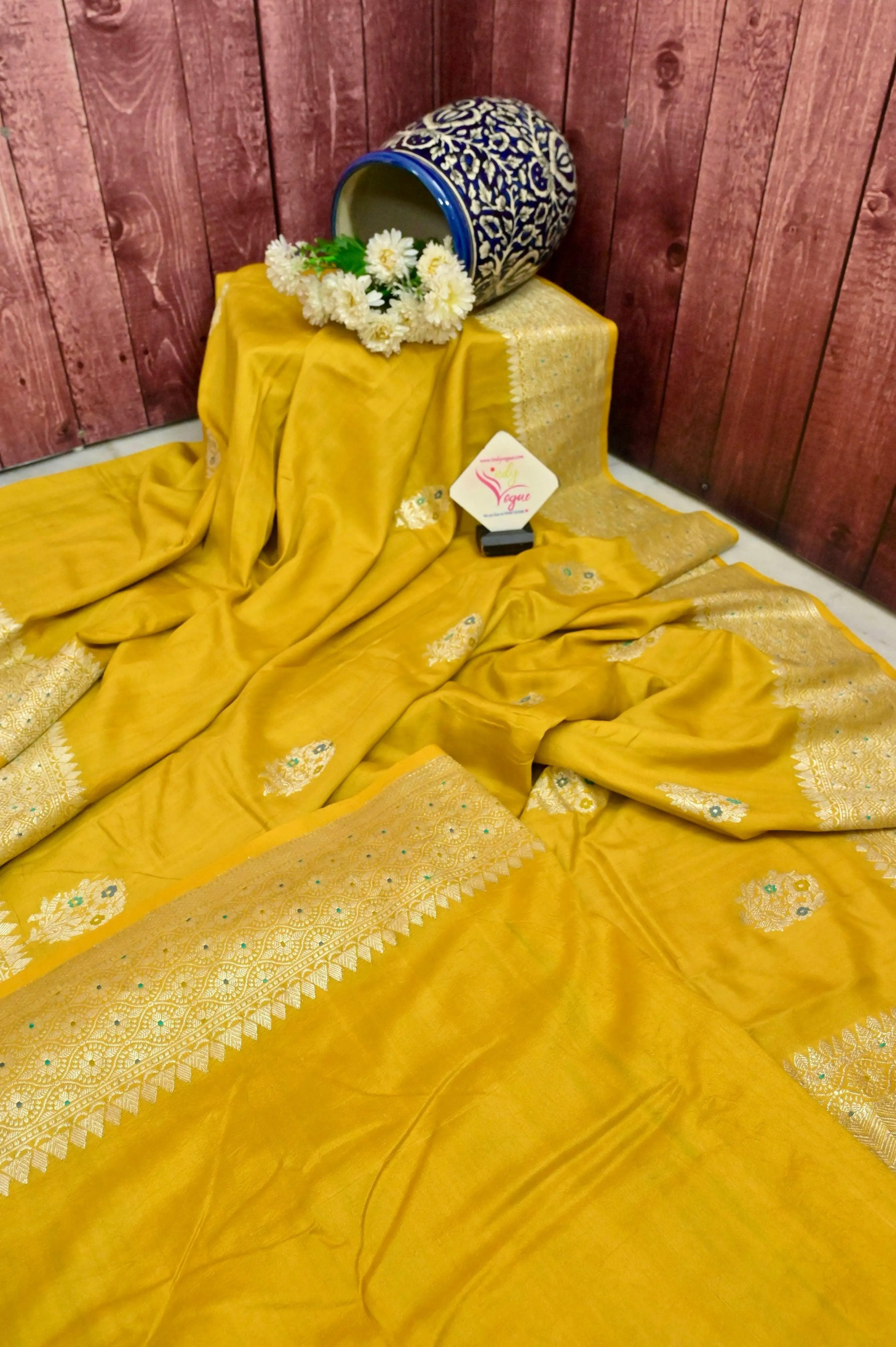 Amber Yellow Color Tussar Georgette Banarasi Saree with Meenakari Buta Work