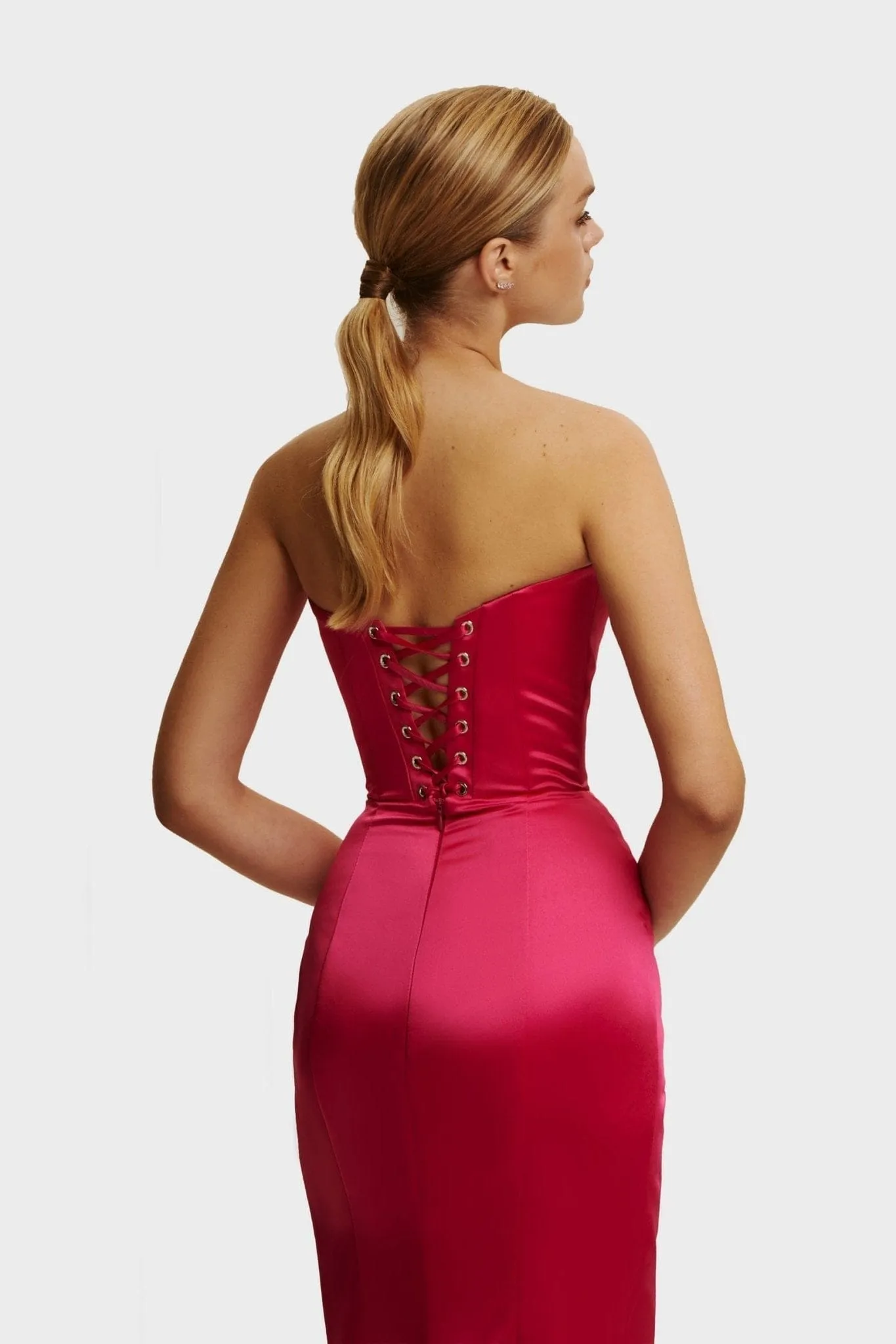 Fuchsia Strapless evening gown with thigh slit